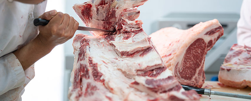 butchers knife cutting meat